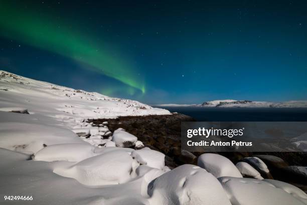 northern lights over the north sea - northern mariana islands stock-fotos und bilder