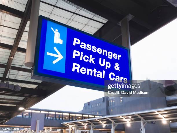 airport signage - car rental stockfoto's en -beelden