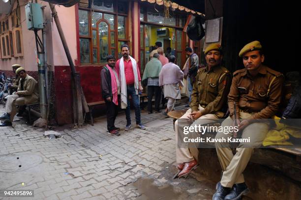 Army pickets seen on duty sitting around a corner in the central market place on January 28, 2018 in Varanasi, India. Varanasi is a major religious...