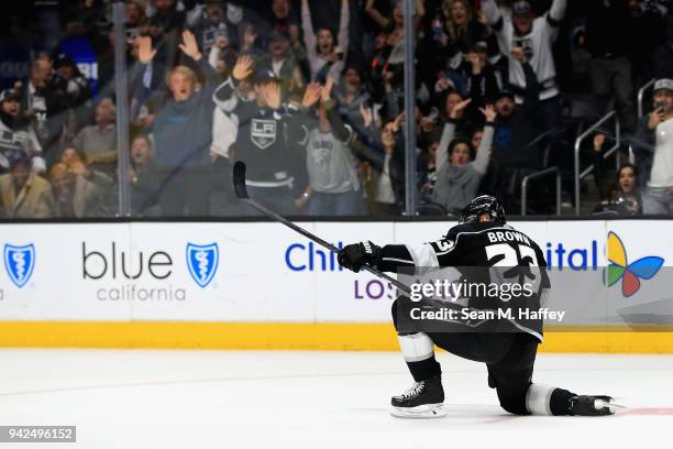 Dustin Brown of the Los Angeles Kings reacts after scoring the winning goal in overtime, his fourth goal of the night against the Minnesota Wild at...