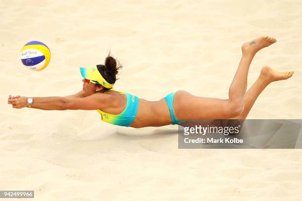 Mariafe Artacho del Solar of Australia dives for the ball during the Beach Volleyball Women Preliminary Pool A match between Mariafe Artacho del...