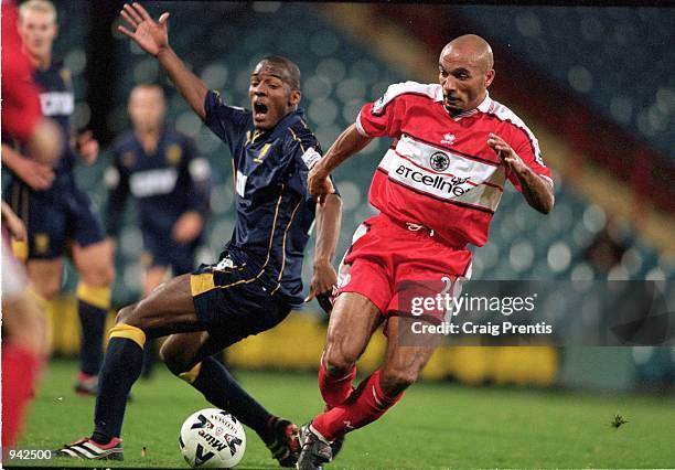 Curtis Fleming of Middlesbrough beats Damien Francis of Wimbledon during the Worthington Cup 3rd round match played at Selhurst Park, in London....