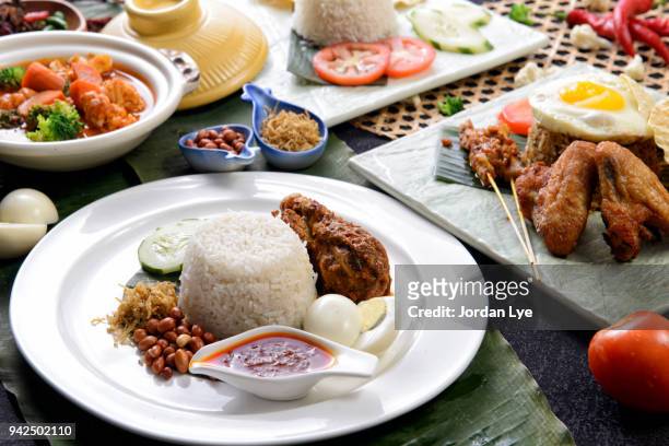 nasi lemak with chicken rendang - traditional malay food stock pictures, royalty-free photos & images