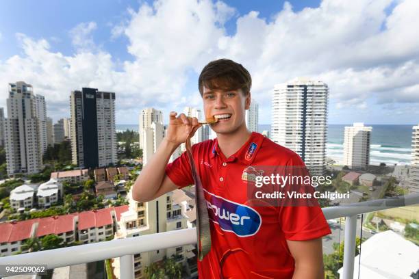 Tom Hamer of England poses with his Gold Medal at the Team England Hotel in Main Beach on day two of the 2018 Commonwealth Games on April 6, 2018 on...