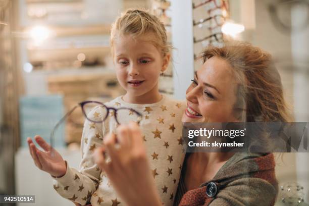 do you like this eyeglasses dear? - optometrist stock pictures, royalty-free photos & images