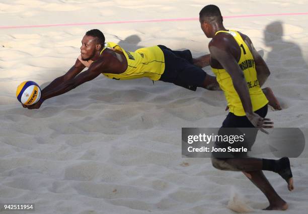 Carlos Acacio and Delcio Soares of Mozambique compete during the Beach Volleyball Preliminary - Pool C match Between Carlos Acacio and Delcio Soares...