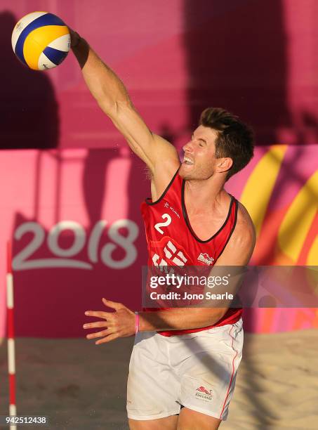 Jake Sheaf of England competes during the Beach Volleyball Preliminary - Pool C match Between Carlos Acacio and Delcio Soares of Mozambique and Chris...