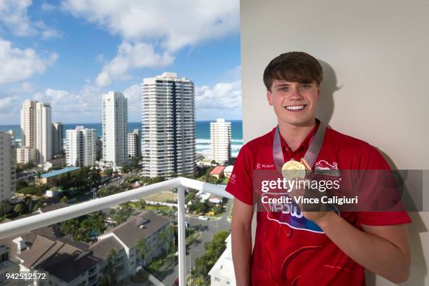 Tom Hamer of England poses with his Gold Medal at the Team England Hotel in Main Beach on day two of the 2018 Commonwealth Games on April 6, 2018 on...