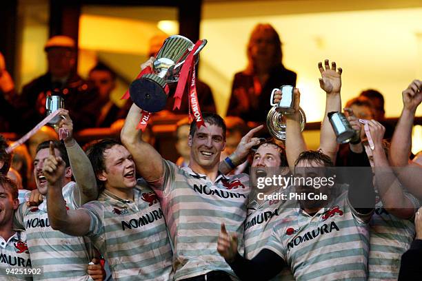 Dan Vickerman holds aloft the trophy after Cambridge University win the Nomura Varsity Rugby match between Oxford University and Cambridge University...