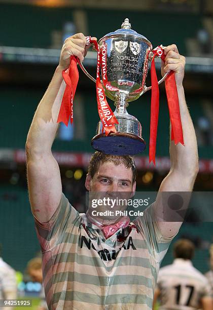 Dan Vickerman holds aloft the trophy after Cambridge University win the Nomura Varsity Rugby match between Oxford University and Cambridge University...