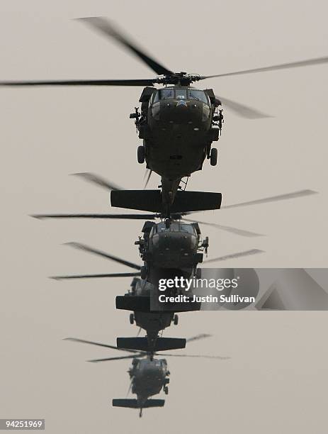 Blackhawk helicopter carrying U.S. Secretary of Defense Robert Gates arrives in the Green Zone December 10, 2009 in Baghdad, Iraq. Secretary Gates...