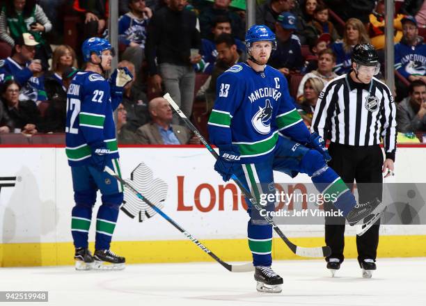 April 3: Daniel Sedin and Henrik Sedin of the Vancouver Canucks skate up ice during their NHL game against the Vegas Golden Knights at Rogers Arena...