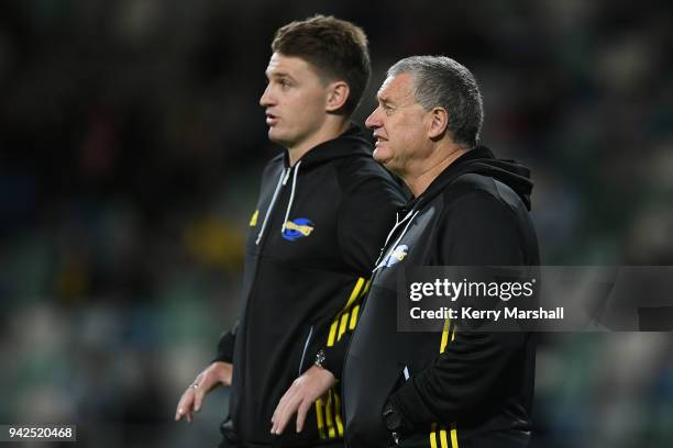 Chris Boyd, head coach of the Hurricanes, looks on with Beauden Barrett before the round eight Super Rugby match between the Hurricanes and the...