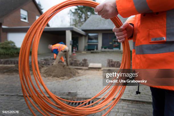 March 14: Deutsche Glasfaser is laying fiber optic cables in rural areas in a FTTH process on March 14, 2018 in BRAMSCHE, GERMANY.