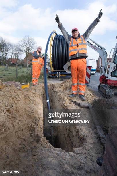 March 14: Deutsche Glasfaser is laying fiber optic cables in rural areas in a FTTH process on March 14, 2018 in BRAMSCHE, GERMANY.