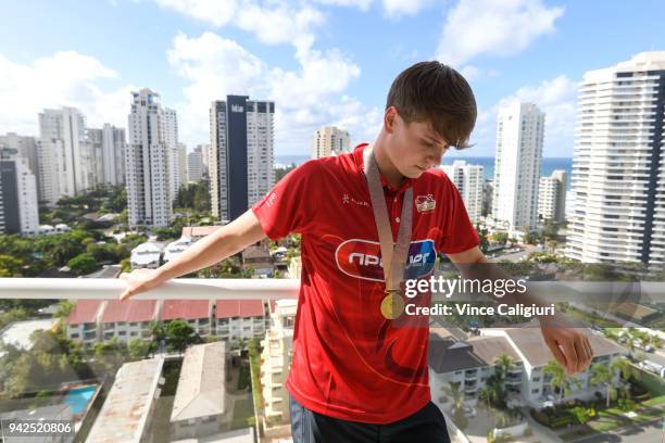 Tom Hamer of England poses with his Gold Medal at the Team England Hotel in Main Beach on day two of the 2018 Commonwealth Games on April 6, 2018 on...