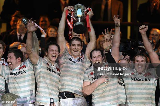 Dan Vickerman, the Cambridge captain, raises the trophy after their victory in the Nomura Varsity match between Oxford University and Cambridge...