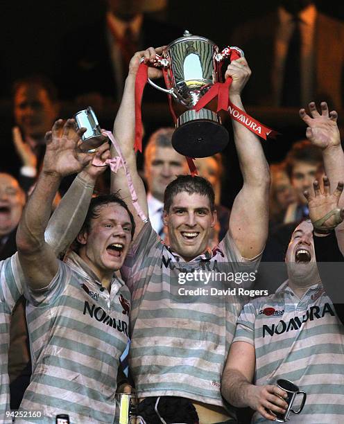 Dan Vickerman, the Cambridge captain, raises the trophy after their victory in the Nomura Varsity match between Oxford University and Cambridge...
