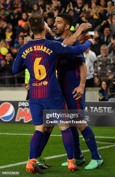 Luis SurezÊ of Barcelona celebrates scoring his goal with Denis Surez and Jordi Alba during the quarter final first leg UEFA Champions League match...