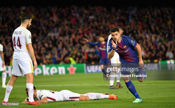 Luis SurezÊ of Barcelona celebrates scoring his goal during the quarter final first leg UEFA Champions League match between FC Barcelona and AS Roma...