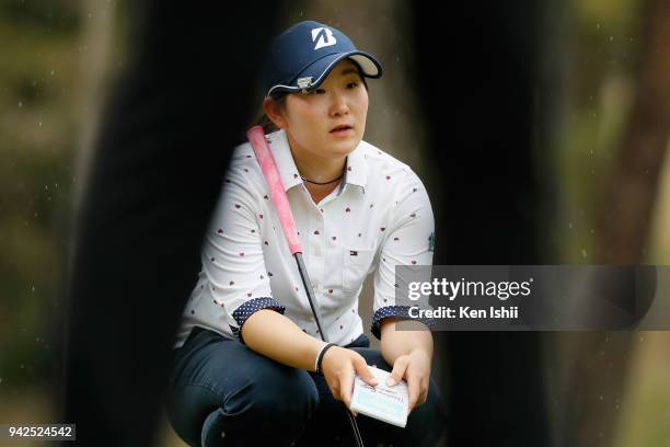 Yumi Kudo of Japan lines up for her putt on the 18th green during the final round of the Hanasaka Ladies Yanmar Golf Tournament at Biwako Country...