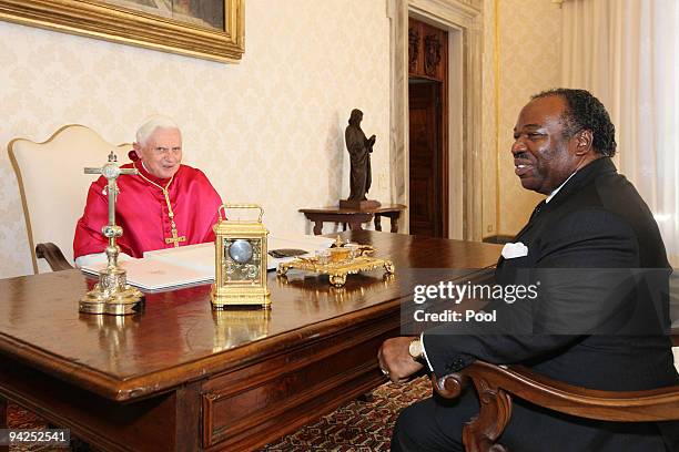 Pope Benedict XVI meets with President of Gabon Ali Bongo Ondimba at his library on December 10, 2009 in Vatican City, Vatican.