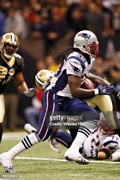 Running back Laurence Maroney of the New England Patriots runs with the ball against the New Orleans Saints at the Louisiana Superdome on November...