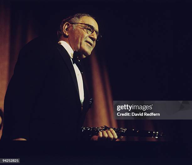 American jazz musician and bandleader Benny Goodman performs on stage in the 1970's.