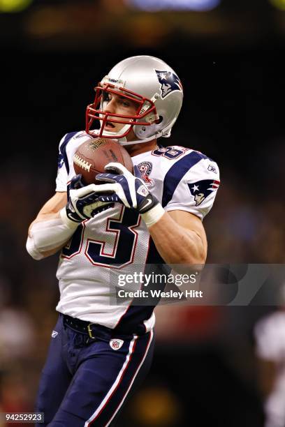 Wide receiver Wes Welker of the New England Patriots catches a pass during warm ups before a game against the New Orleans Saints at the Louisiana...