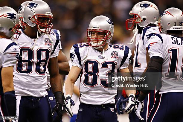 Wide receiver Wes Welker of the New England Patriots in the huddle during a game against the New Orleans Saints at the Louisiana Superdome on...