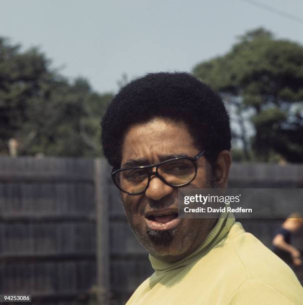 American jazz trumpeter Dizzy Gillespie posed backstage prior to a festival performance, circa 1970.