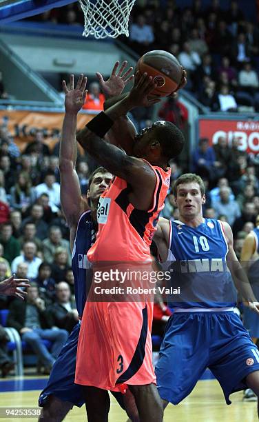 Marin Rozic, #20 of Cibona competes with Terence Morris, #23 of Regal FC Barcelona competes during the Euroleague Basketball Regular Season 2009-2010...