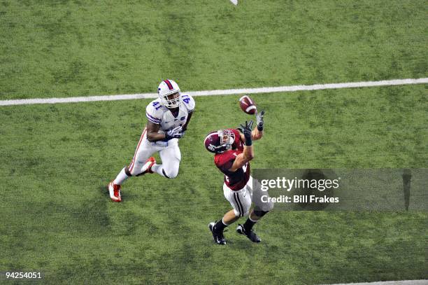 Championship: Alabama Colin Peek in action, making touchdown catch over Florida Ryan Stamper . Cover. Atlanta, GA 12/5/2009 CREDIT: Bill Frakes