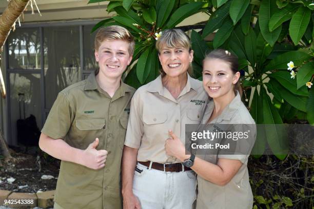 Bob Irwin, Terri Irwin and Bindi Irwin pose for a photo before a roundtable meeting, discussing coral resilience on Lady Elliot Island on April 6,...