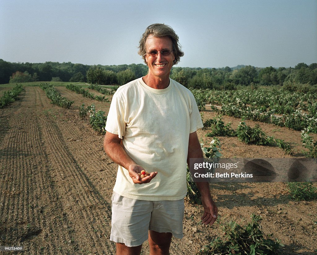 Man holding raspberries