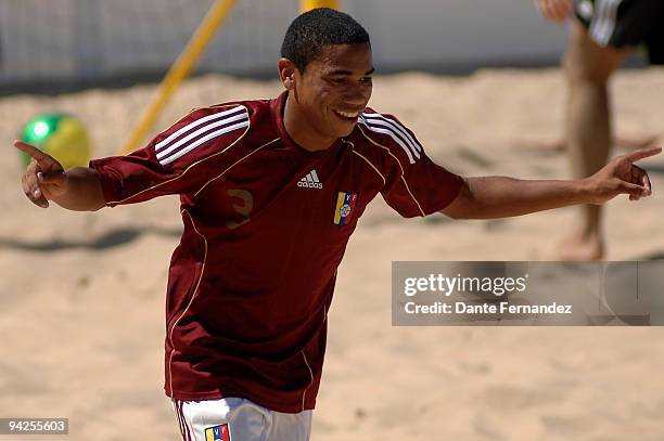 Venezuela's Alexander celebrates a scored goal dduring their beach soccer match against Paraguay for the South American Beach Games at Pocitos Beach...