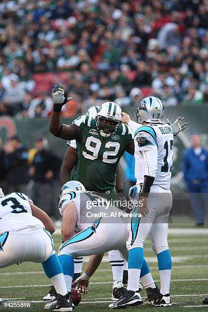 Defensive End Shaun Ellis of the New York Jets gestures to disrupt the call of Quarterback Jake Delhomme of the Carolina Panthers at Giants Stadium...