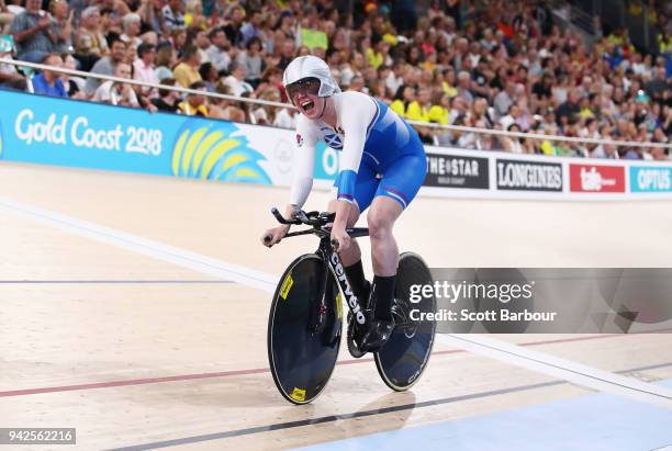 Katie Archibald of Scotland celebrates winning gold in the Women's 3000m Individual Pursuit Gold Final during the Cycling on day two of the Gold...