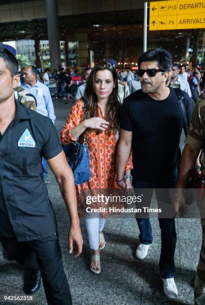 Bollywood actors Neelam and her husband Samir Soni arrive at Mumbai airport after been acquitted in the Blackbuck poaching case, on April 5, 2018 in...