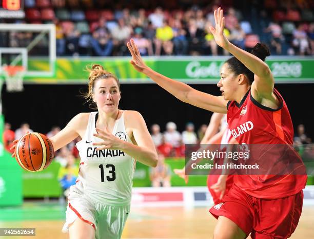 Paige Crozon of Canada drives to the basket past Azania Stewart of England during the womenÕs Pool A Basketball match between England and Canada on...