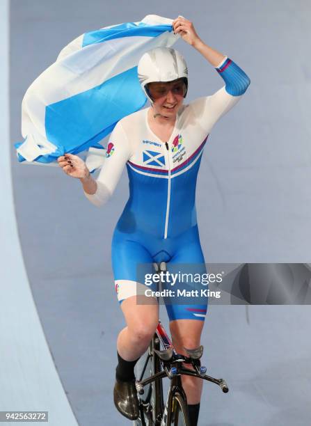 Katie Archibald of Scotland celebrates winning gold in the Women's 3000m Individual Pursuit Gold Final during the Cycling on day two of the Gold...