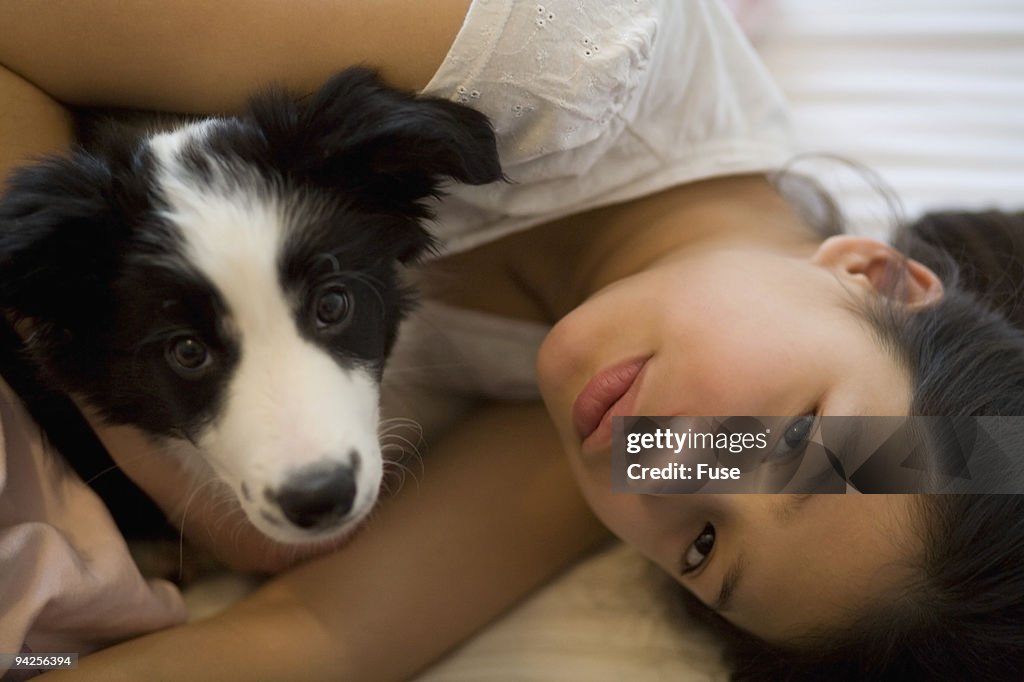 Girl and puppy