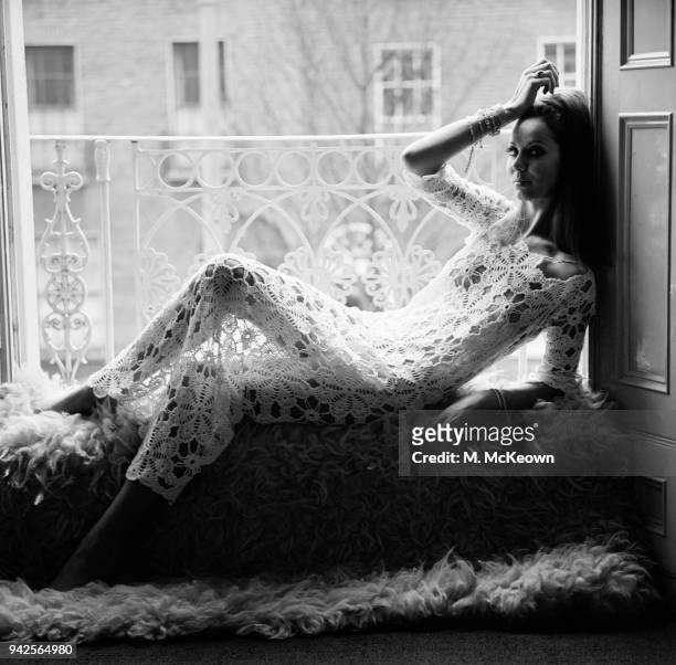 Irish fashion model Liz Willoughby wearing white long lace dress, UK, 28th March 1968.
