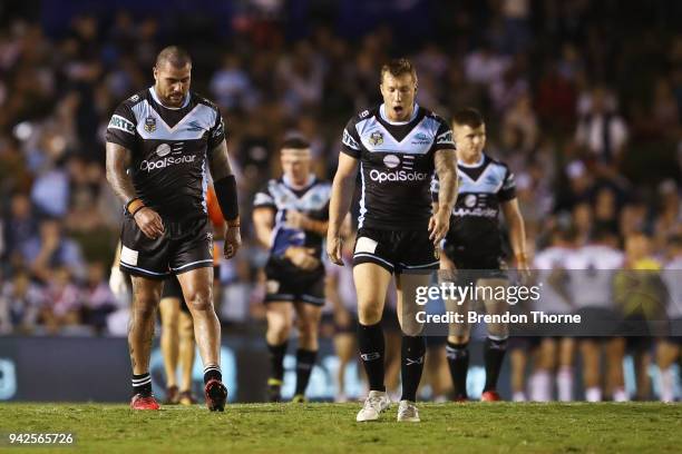 Sharks players show their dejection during the round five NRL match between the Cronulla Sharks and the Sydney Roosters at Southern Cross Group...