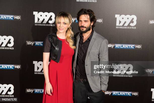 Italian actors Laura Chiatti and Marco Bocci attend the tv fiction premiere 1993 by Sky Tv at Spacecinema Odeon. Milan, May 11th, 2017