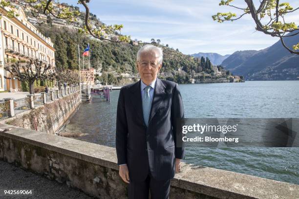 Mario Monti, former Italian prime minister, poses for a photograph following a Bloomberg Television interview, on the sidelines of the 29th edition...