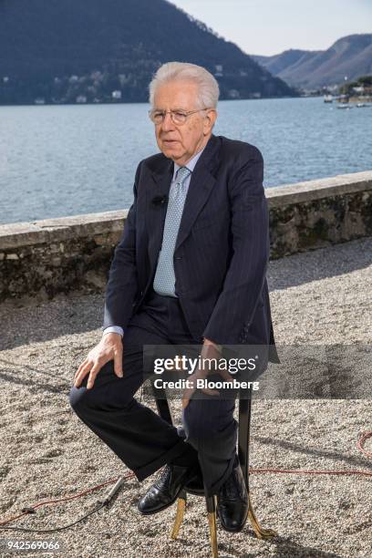 Mario Monti, former Italian prime minister, pauses during a Bloomberg Television interview, on the sidelines of the 29th edition of "The Outlook for...