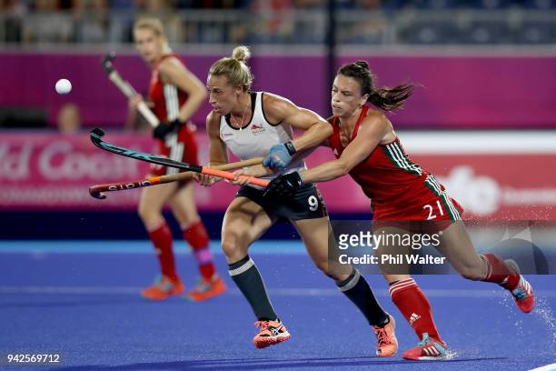 Susannah Townsend of England and Xenna Hughes of Wales contest the ball during their Womens Hockey match between England and Wales on day two of the...