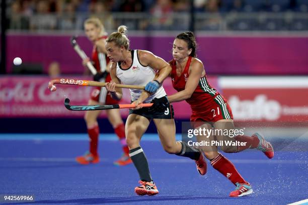 Susannah Townsend of England and Xenna Hughes of Wales contest the ball during their Womens Hockey match between England and Wales on day two of the...