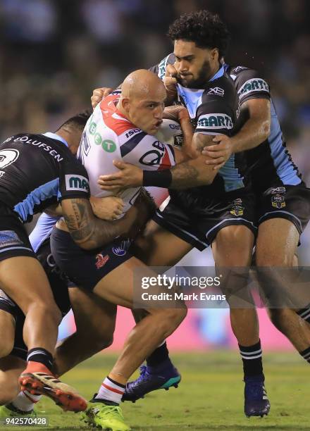 Blake Ferguson of the Roosters is tacked during the round five NRL match between the Cronulla Sharks and the Sydney Roosters at Southern Cross Group...